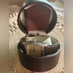 Tommy Bahama watch with leather strap. Original box with manual included.